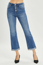 Button Fly Cropped Bootcut Risen Jeans showcasing stylish retro design and perfect cropped length paired with black heels.