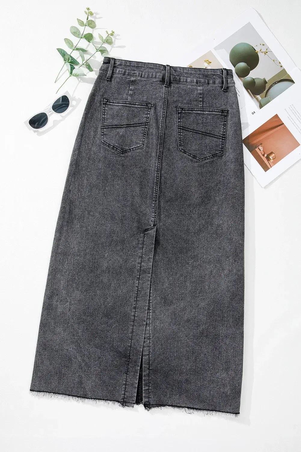 Back view of Bella Road Raw Hem Midi Denim Skirt with Pockets, featuring a stylish, edgy design perfect for any adventure.