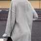 Woman wearing a grey waffle-knit Johnny collar long sleeve sweatshirt with slightly stretchy material, shown from the back.