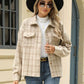 Woman wearing Bella Road Plaid Collared Neck Long Sleeve Jacket with sunglasses, hat, and jeans on the street