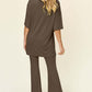 DOUBLE TAKE Full Size Round Neck Drop Shoulder T-Shirt and Flare Pants Set at Bella Road