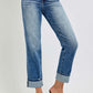 Stylish high-rise crop jeans with rolled-up hem, perfect for casual and special occasions. Versatile wardrobe essential.