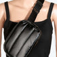 Sleek black quilted nylon crossbody bag displayed on a mannequin, showcasing its practical and stylish design.