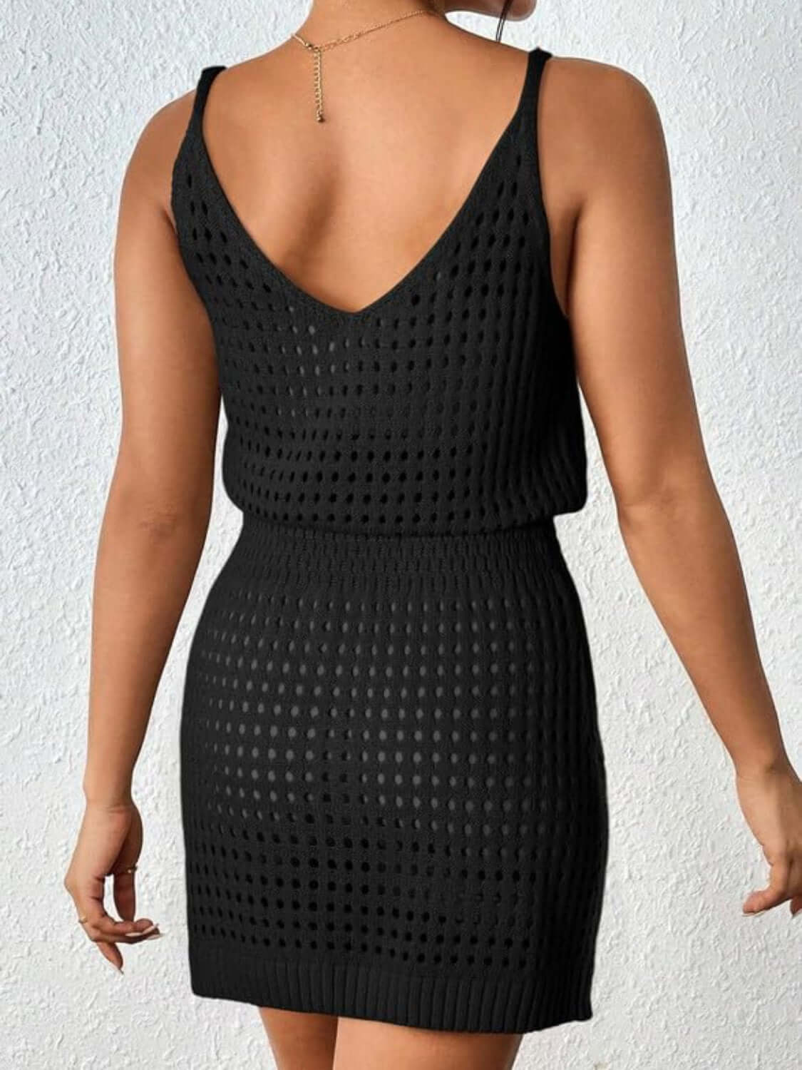 Openwork V-neck sleeveless cover up dress in black, featuring a sheer and stretchy 100% acrylic material, shown from the back.