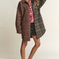 Stylish J.NNA snap-down tweed plaid longline shacket, perfect for fall layering, combining classic and modern fashion elements.