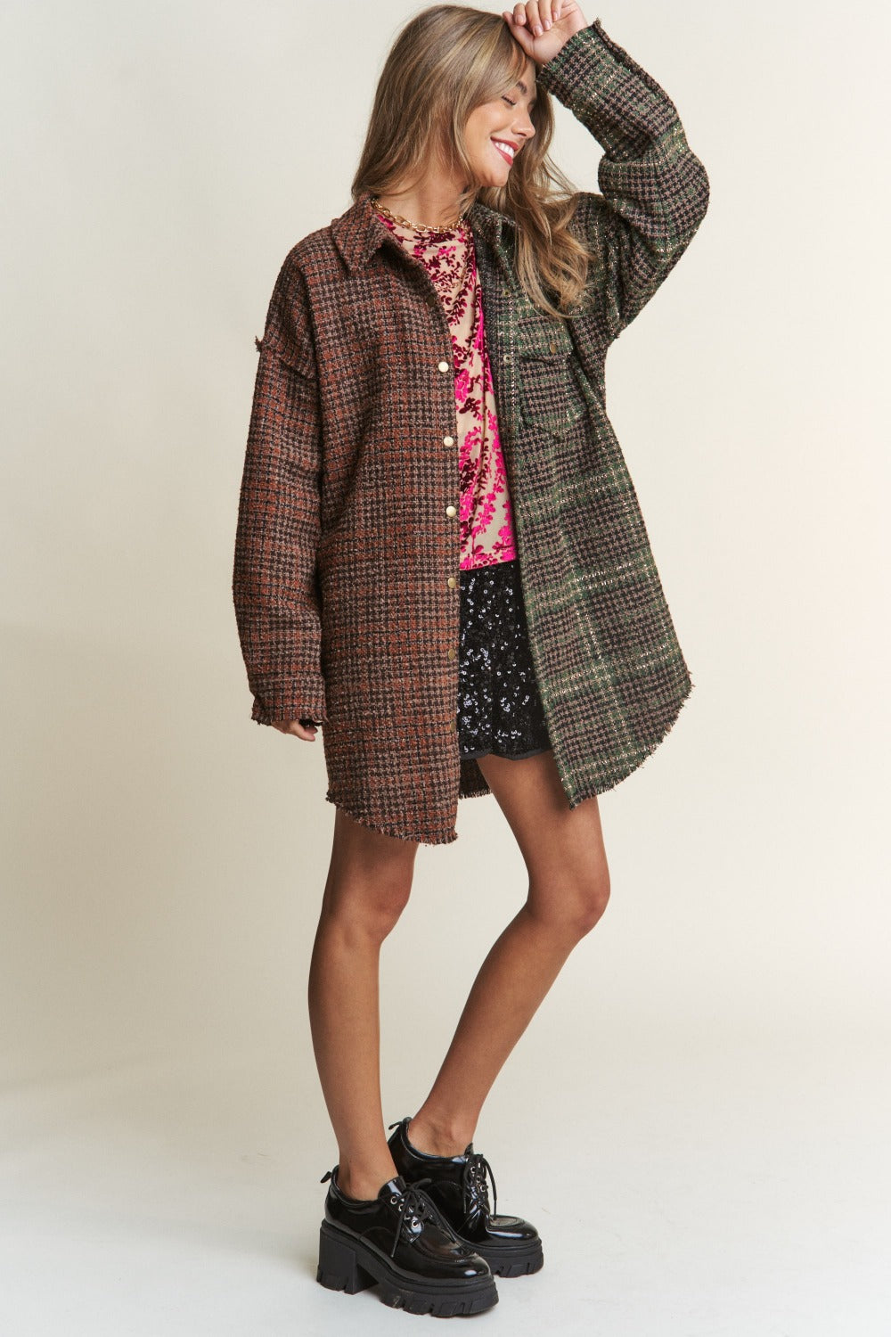 Stylish J.NNA snap-down tweed plaid longline shacket, perfect for fall layering, combining classic and modern fashion elements.