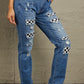 Baeful Checkered Patchwork Mid Waist Distressed Jeans in flat lay, featuring unique patchwork and distressed details.