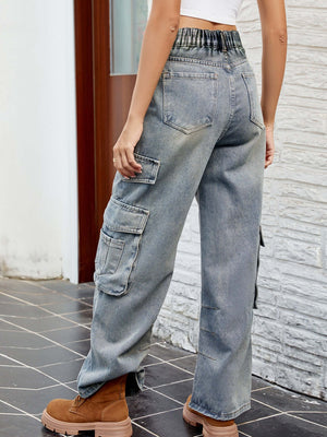 Woman wearing Bella Road washed jeans with pockets, showing back view, paired with boots