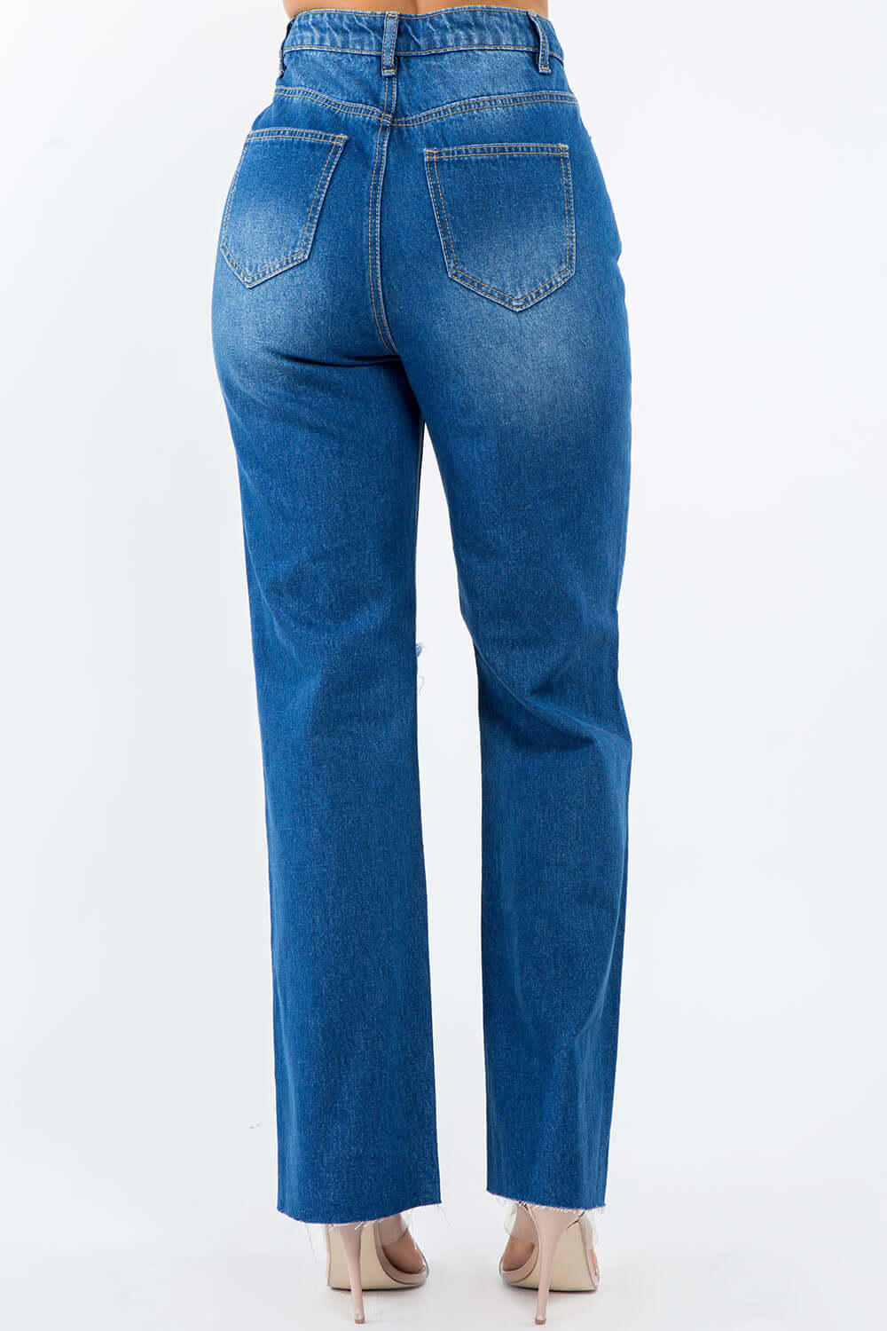 Back view of High Waist Distressed Wide Leg Jeans showcasing button waist closure and retro-styled wide leg silhouette.