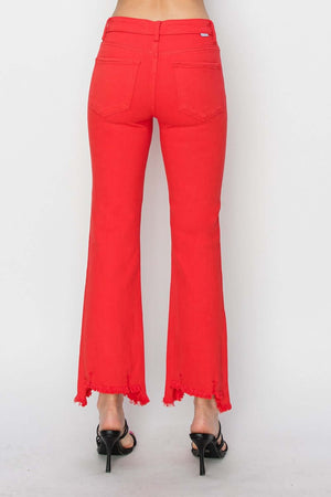 Red raw hem bootcut jeans with pockets by Risen Jeans, shown from the back, perfect for a petite figure and a touch of edgy style.