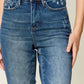 Woman wearing Judy Blue tummy control high waist slim jeans in full size