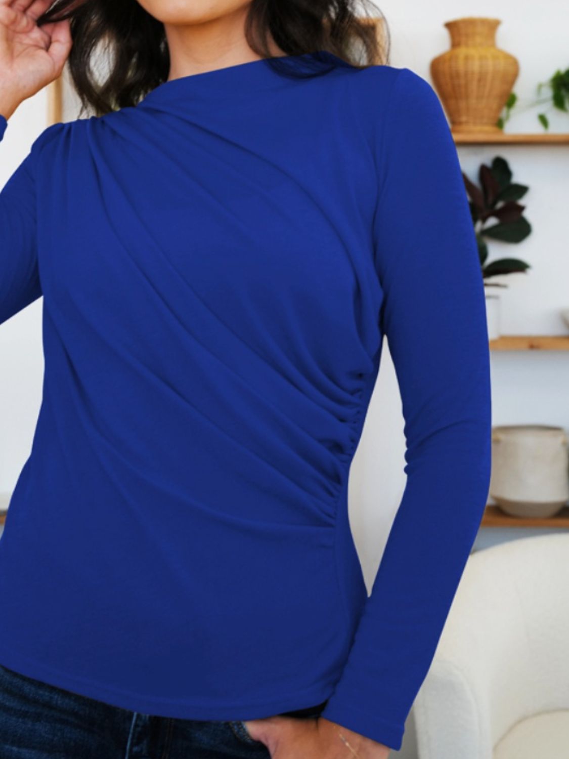 Woman wearing FAM-FAM Ruched Mock Neck Long Sleeve T-Shirt in French Blue, showcasing stylish fall fashion.