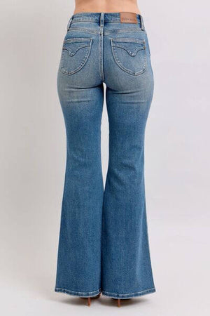 Back view of Judy Blue Mid Rise Tummy Control Vintage Wash Jeans showcasing a flattering vintage design and flare.