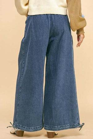 Back view of Davi & Dani drawstring hem wide leg mid-rise jeans, showcasing a stylish and comfortable fit.