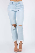 High Waist Distressed Raw Hem Jeans with trendy rips and edgy raw hem detailing for a stylish, casual look.