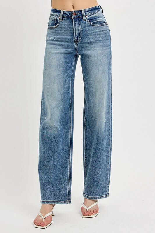 RISEN distressed wide leg jeans in blue, featuring a relaxed fit and trendy style for plus sizes.