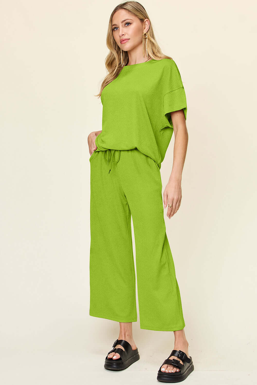 DOUBLE TAKE Full Size Texture Round Neck Short Sleeve T-Shirt and Wide Leg Pants at Bella Road