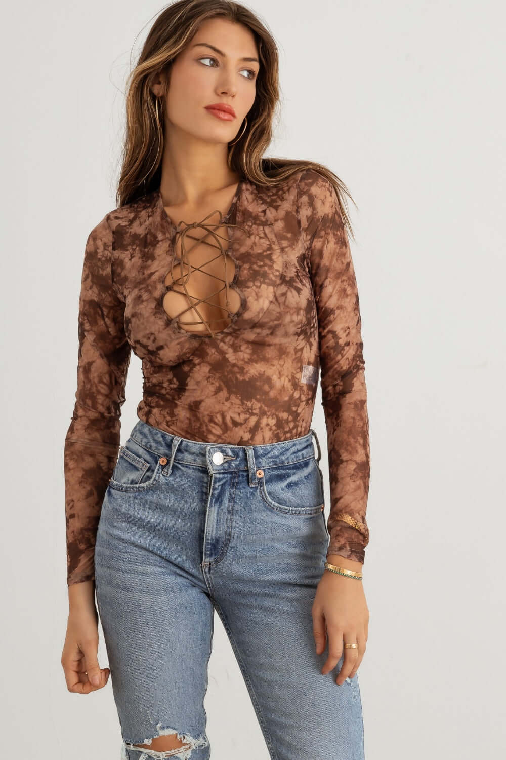 TASHA APPAREL Abstract Mesh Lace-Up Long Sleeve Bodysuit at Bella Road