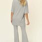 DOUBLE TAKE Full Size Round Neck Drop Shoulder T-Shirt and Flare Pants Set at Bella Road