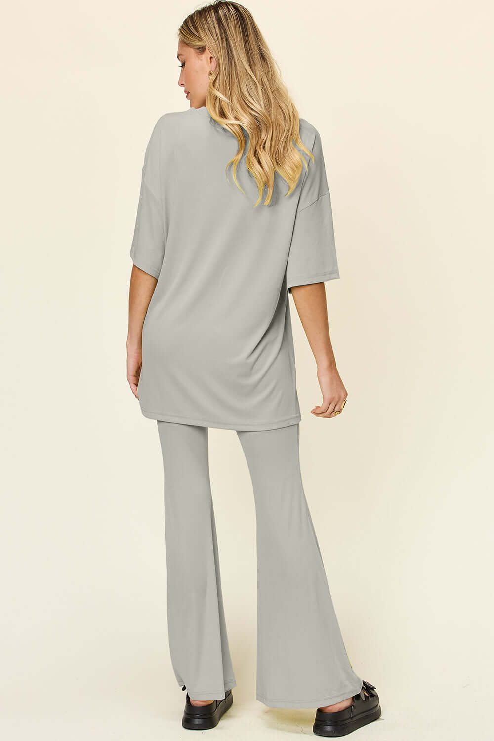 DOUBLE TAKE Full Size Round Neck Drop Shoulder T-Shirt and Flare Pants Set at Bella Road