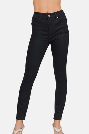 High-Rise Skinny Jeans with slimming effect and sleek fit, perfect for showcasing curves and pairing with any top or shoe style