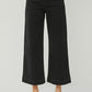 RISEN Full Size High Rise Wide Leg Ankle Jeans in black, perfect for trendy outfits and showcasing shoes.