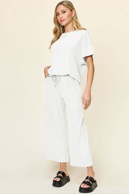 DOUBLE TAKE Full Size Texture Round Neck Short Sleeve T-Shirt and Wide Leg Pants at Bella Road