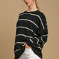 Cozy Umgee wool blend striped round neck sweater in black and white, perfect for stylish layering in cooler weather.