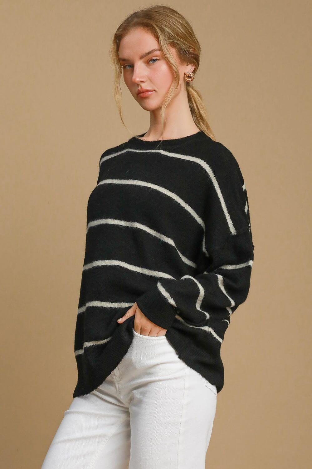 Cozy Umgee wool blend striped round neck sweater in black and white, perfect for stylish layering in cooler weather.