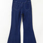 Back view of blue asymmetric waist flare jeans for women showing pocket details and unique flared design.