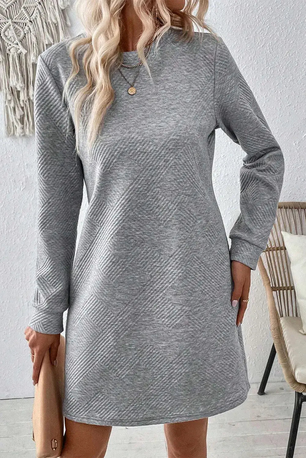 Bella Road grey textured round neck long sleeve mini dress, perfect for casual outings and comfortable styling.