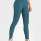 Millennia highly stretchy yoga leggings in teal with wide waistband, perfect for comfort and flexibility in workouts.