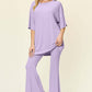 DOUBLE TAKE Full Size Round Neck Drop Shoulder T-Shirt and Flare Pants Set at Bella Road