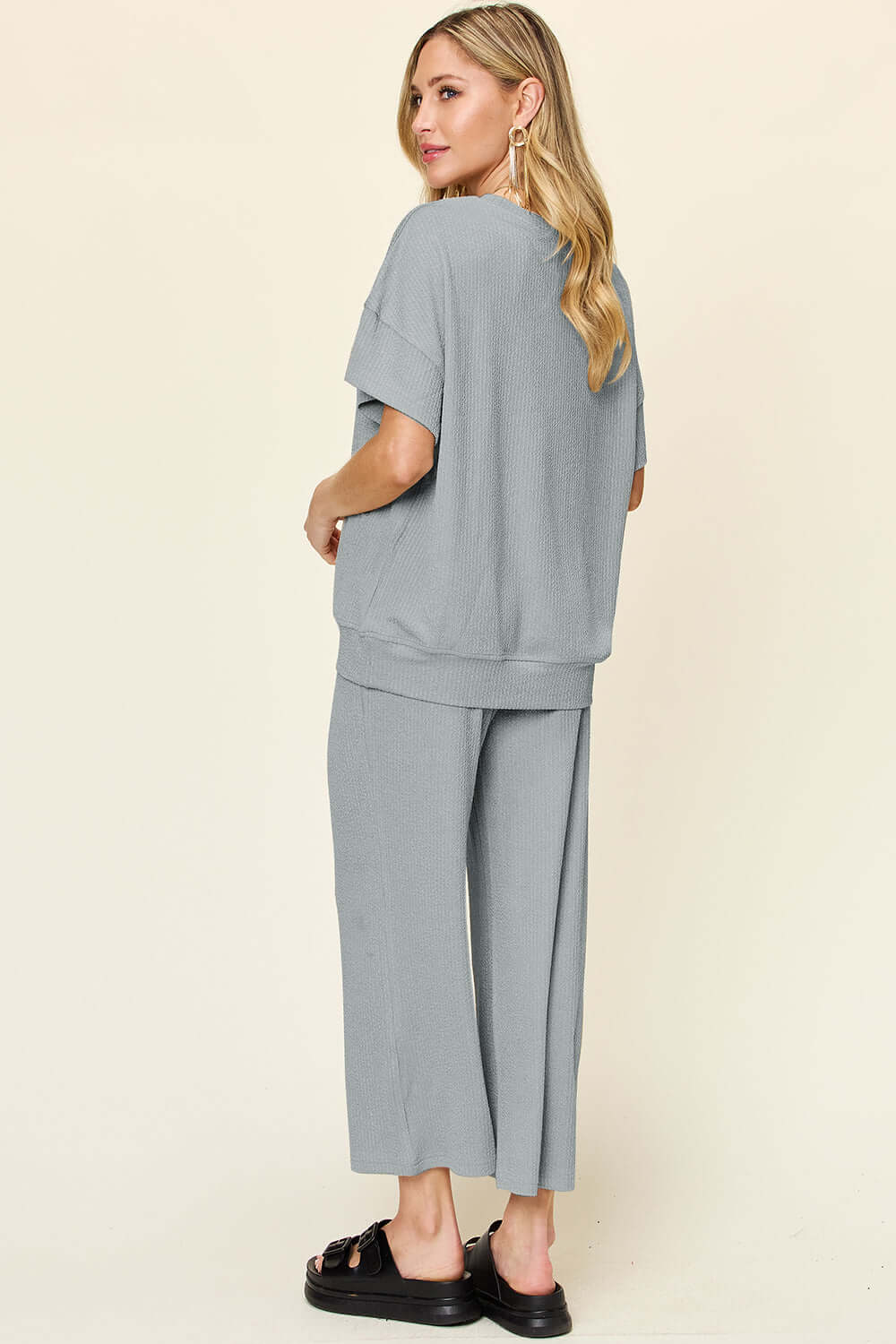 DOUBLE TAKE Full Size Texture Round Neck Short Sleeve T-Shirt and Wide Leg Pants at Bella Road