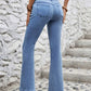 Woman wearing Bella Road High Waist Flare Jeans with Pockets in light wash, showing retro style and moderate stretch for any occasion.