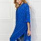 JUSTIN TAYLOR Pom-Pom Asymmetrical Poncho Cardigan in Blue at Bella Road