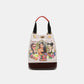 Nicole Lee USA Multifunctional Bucket Bag Backpack with vibrant artwork, adjustable straps, and floral design on a white background.