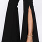 American Bazi side slit flare jeans in black paired with nude block heels, showcasing trendy side slits and flattering flare legs