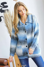 Stylish woman in a blue gradient cardigan with pockets, featuring a bold collar and button-up design, perfect for layering.