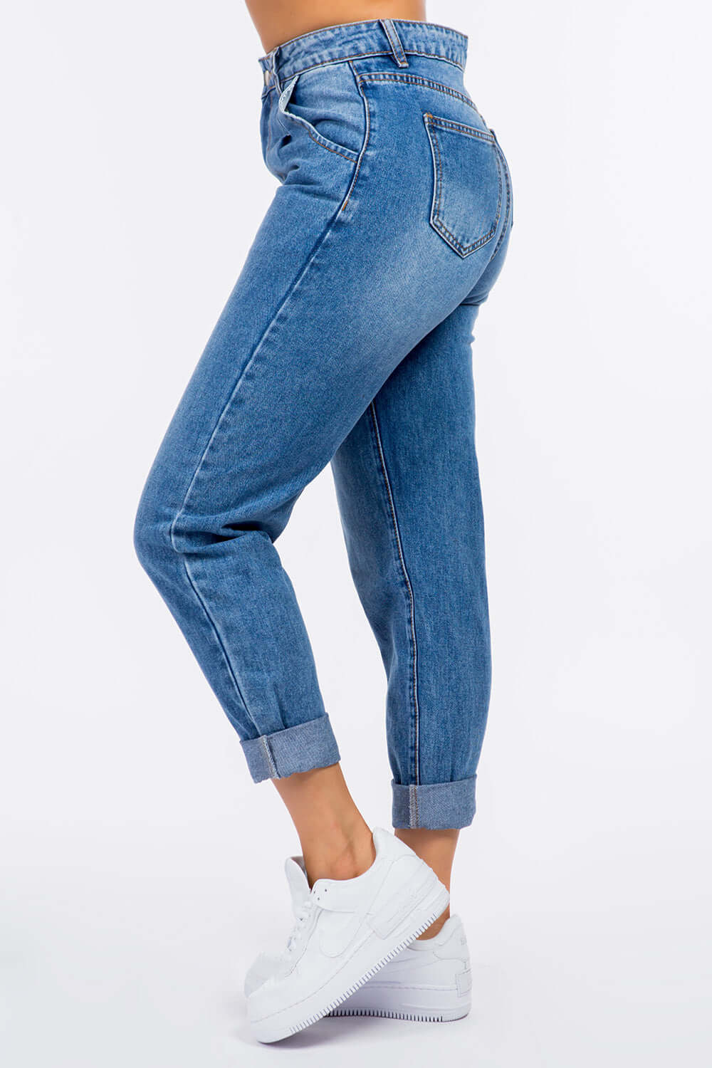 High Waist Pleated Mom Jeans in non-stretch denim with rolled cuffs and white sneakers