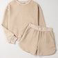 Bella Road Quilted Round Neck Long Sleeve Top and Shorts Set in beige, perfect for cozy lounging or casual outings.