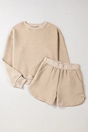 Bella Road Quilted Round Neck Long Sleeve Top and Shorts Set in beige, perfect for cozy lounging or casual outings.