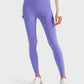 Stylish Millennia wide waistband sports leggings in purple with pockets, perfect for workouts and everyday wear.