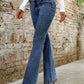 Stylish Bella Road Bootcut Jeans in medium wash, featuring pockets and a flattering fit, perfect for any casual outing.