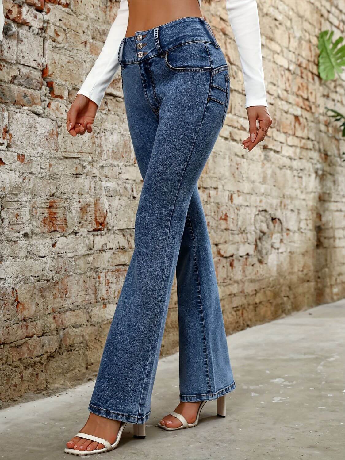 Stylish Bella Road Bootcut Jeans in medium wash, featuring pockets and a flattering fit, perfect for any casual outing.