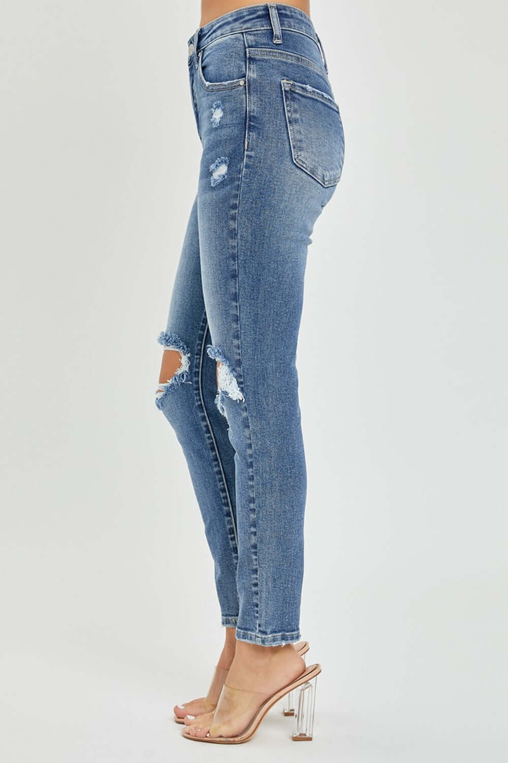 High Rise Knee Distressed Skinny Risen Jeans featuring trendy distressed detailing, high-rise waist, and flattering skinny fit.