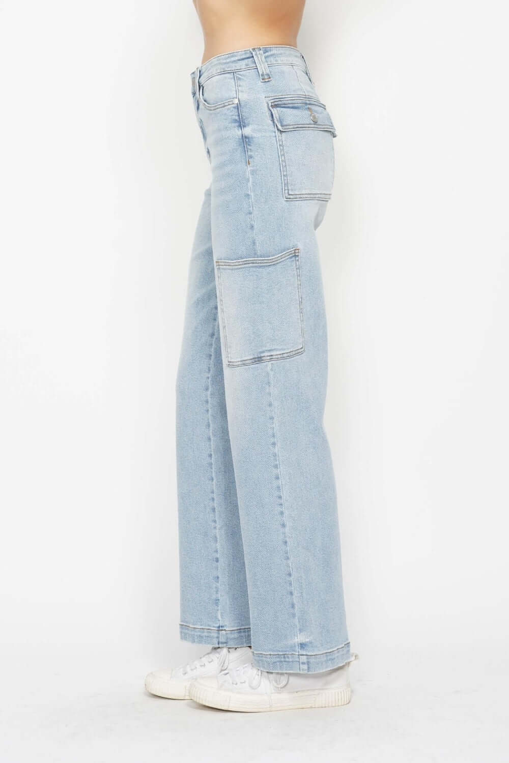 High waist straight cargo jeans with multiple pockets in light blue, Judy Blue Jeans, side profile displaying practical design and versatility