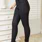 High Rise Black Coated Ankle Skinny Jeans with Exposed Buttons and Glossy Finish