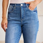 Woman wearing Mini Mia Full Size Tummy Control High Waist Jeans by RFM Jeans, showcasing a flattering and comfortable fit.