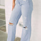 Trendy distressed high waist jeans with slight stretch, perfect for a casual stylish look. Machine washable and imported.